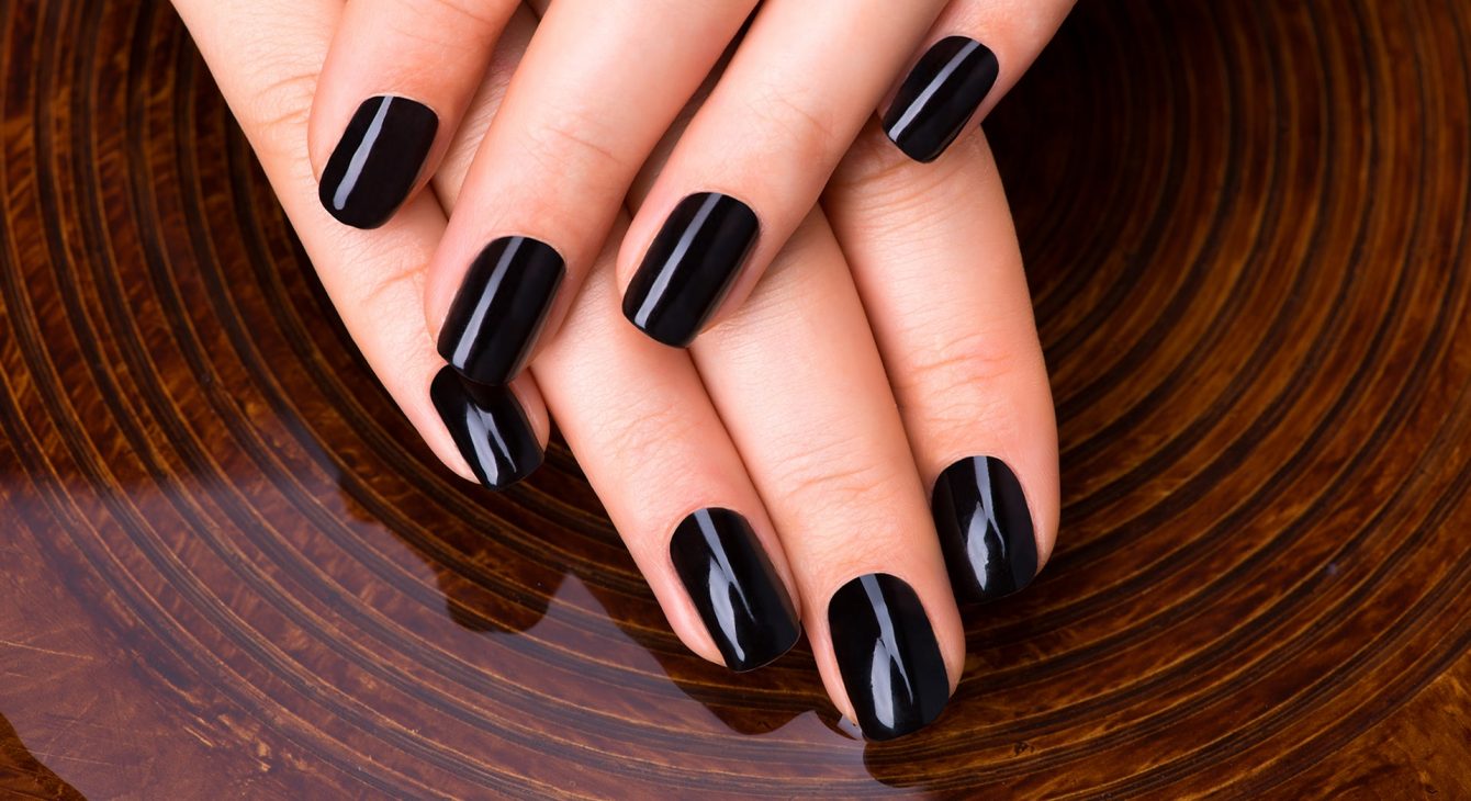 beautiful-women-hands-with-black-manicure-after-spa-procedures-spa-treatment-concept