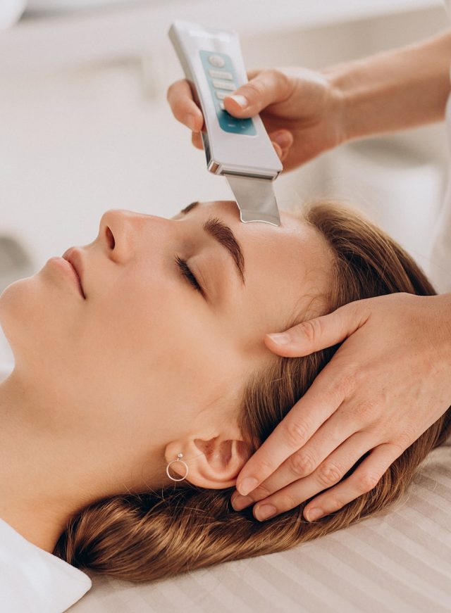 woman-having-beauty-treatment-procedures-salon
